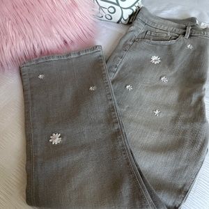Grey jeans with Daisy embroidered on them